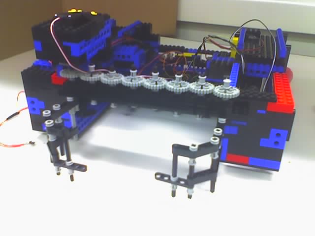 Robot even closer to completion with mounted servo and no more platform.  Setting for Handyboard not yet complete
